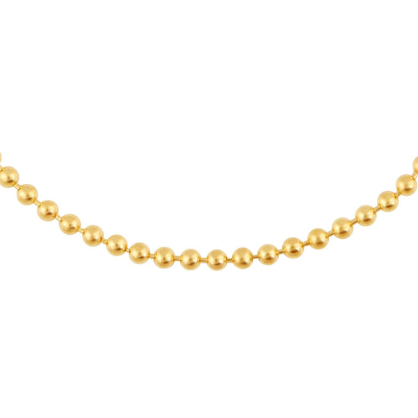 Gold ball bracelet on a white background