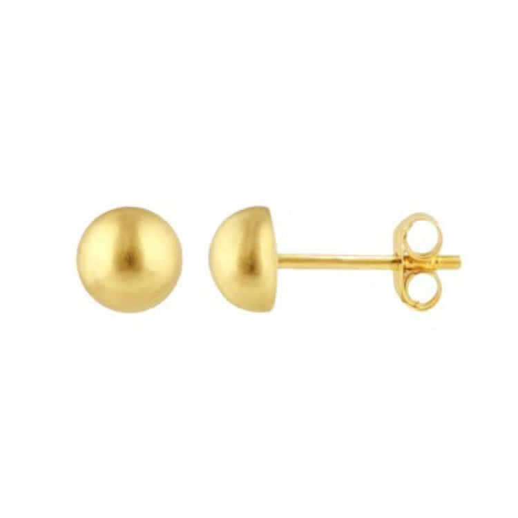Gold dome earrings on a white background