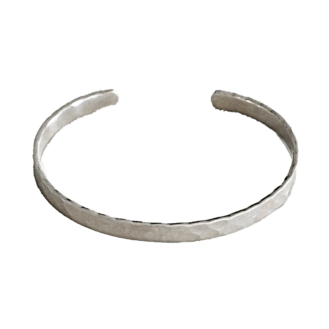 Silver bangle on a white background
