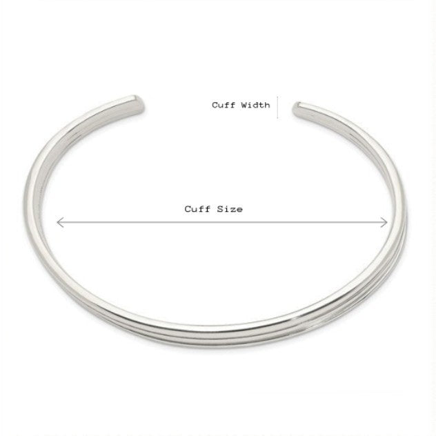 Silver bangle with labeled cuff width and size on a white background