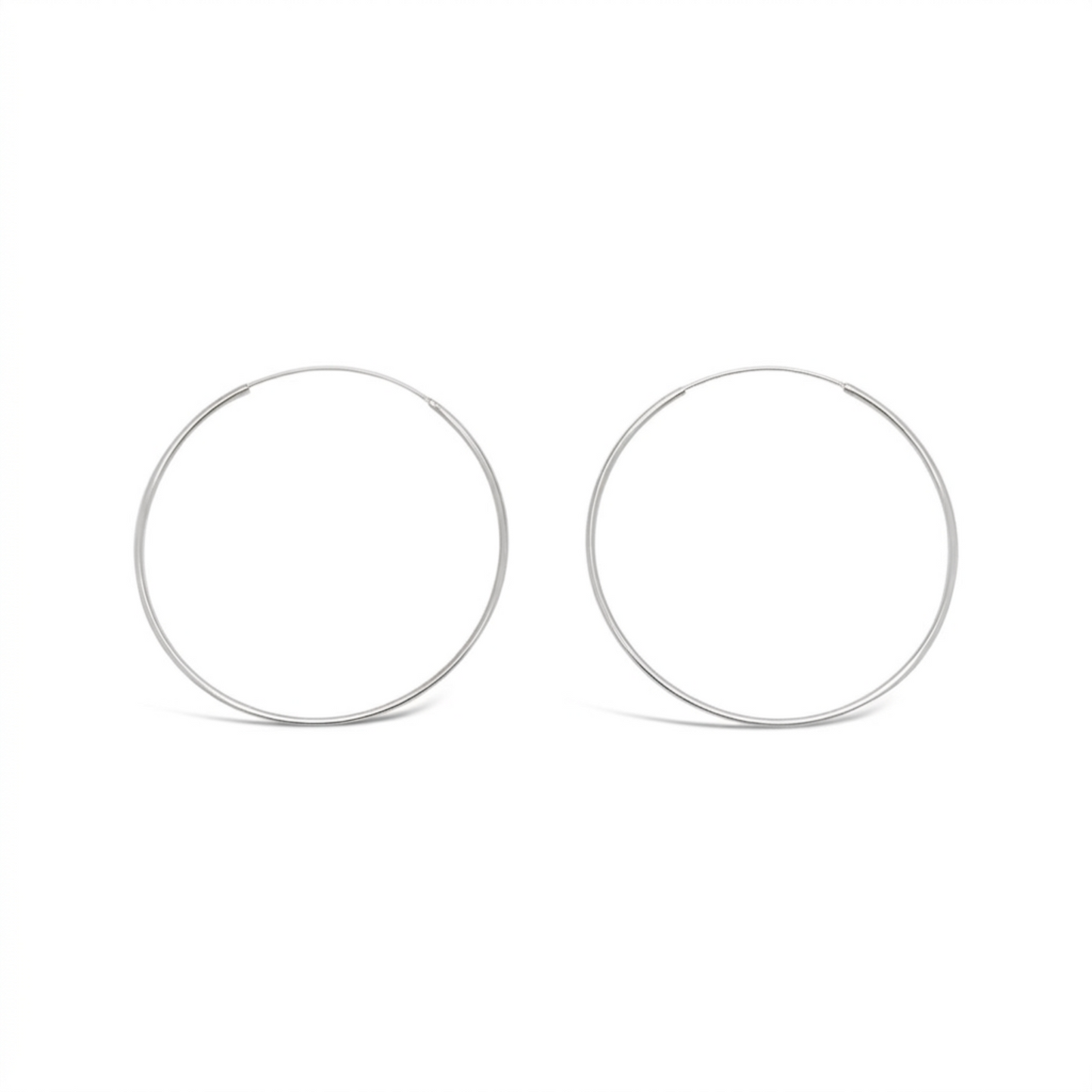 Pair of 50mm 925 sterling silver fine hoop earrings on a clean white background