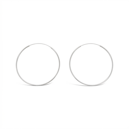 Pair of 50mm 925 sterling silver fine hoop earrings on a clean white background