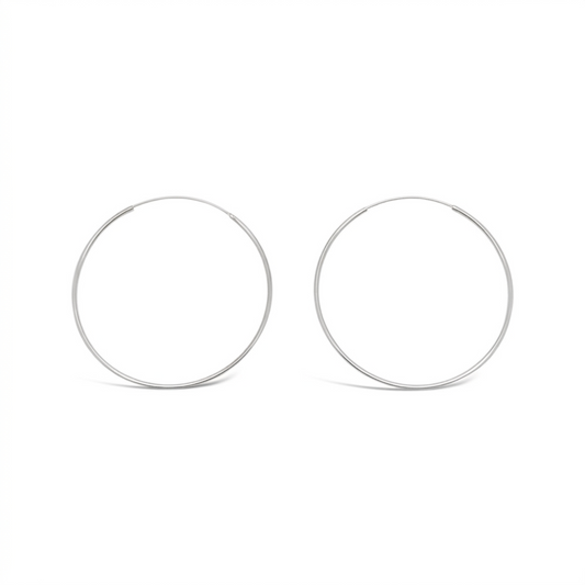 Pair of 50mm 925 sterling silver fine hoop earrings on a clean white background