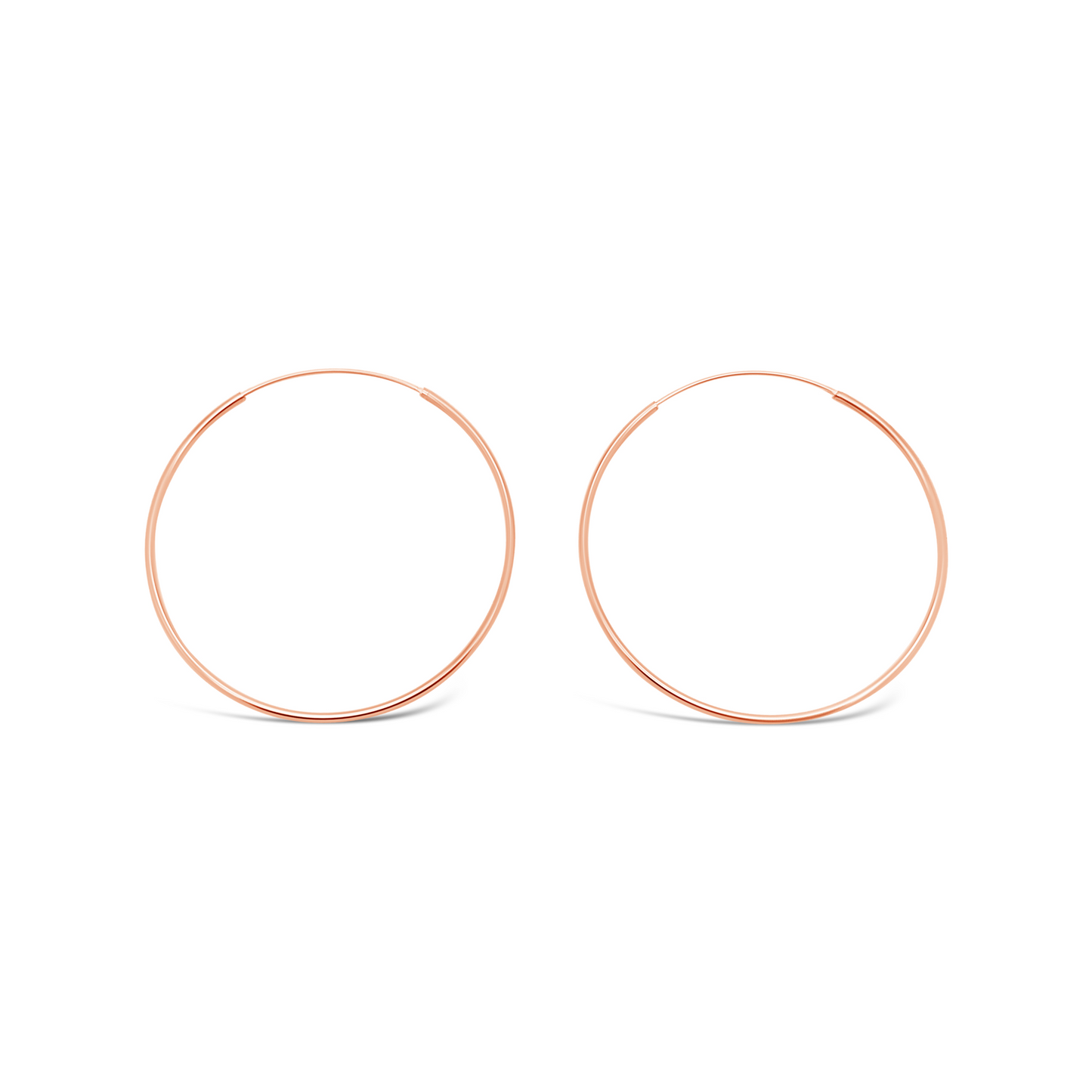 Pair of 50mm 925 sterling silver rose gold fine hoop earrings on a clean white background