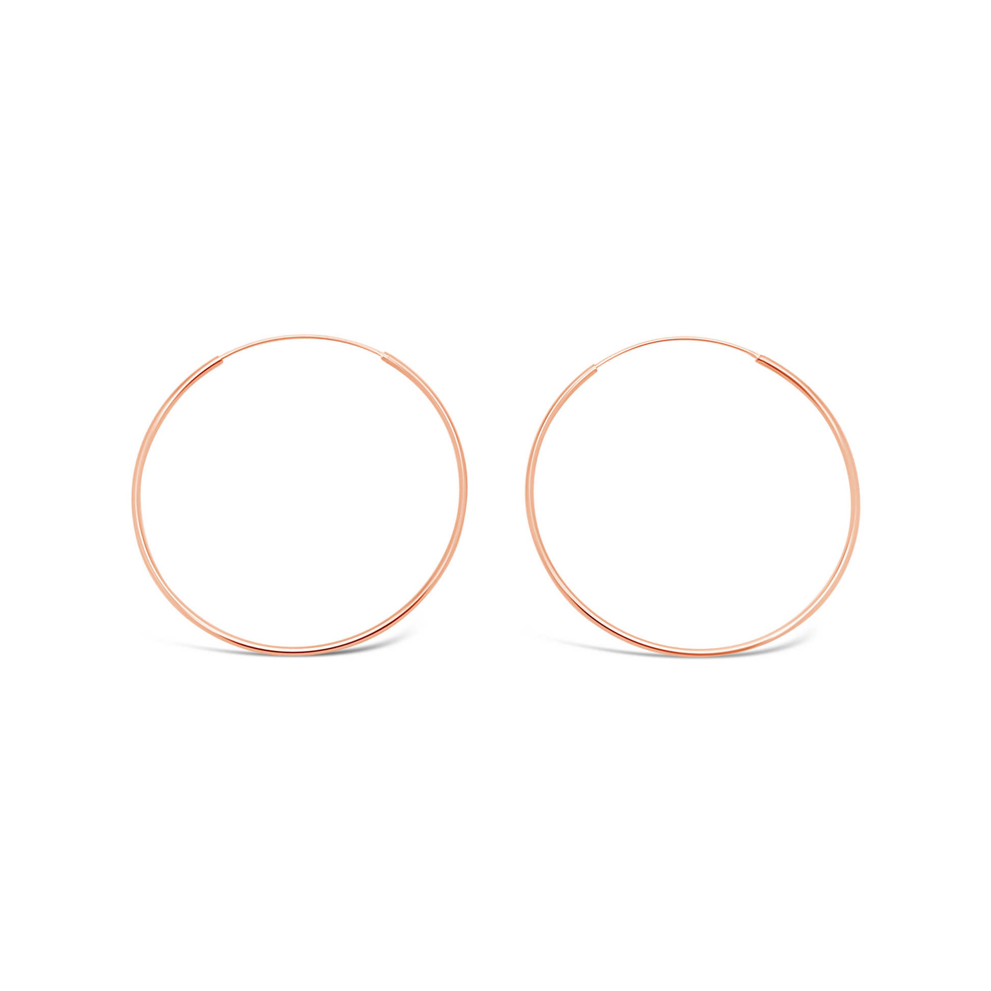 Pair of 50mm 925 sterling silver rose gold fine hoop earrings on a clean white background