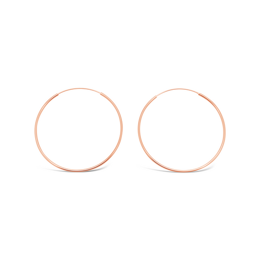 Pair of 50mm 925 sterling silver rose gold fine hoop earrings on a clean white background