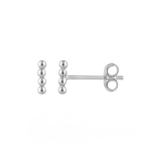 Pair of silver stud earrings on a white background