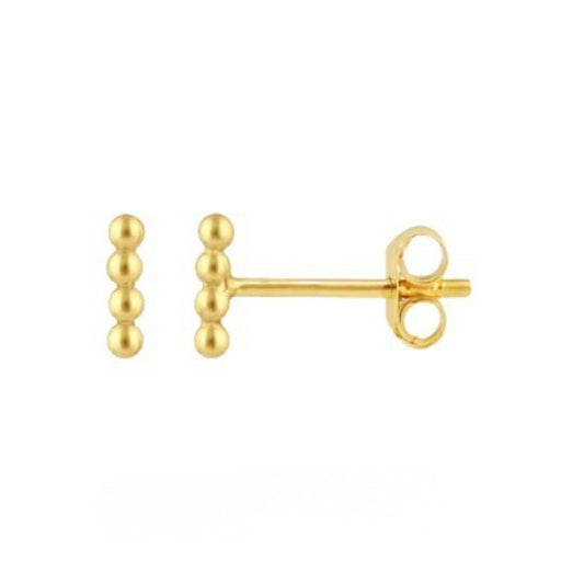 Gold stud earrings on a white background