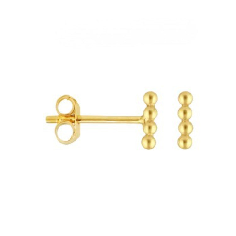 Gold earring with three spherical beads on a white background