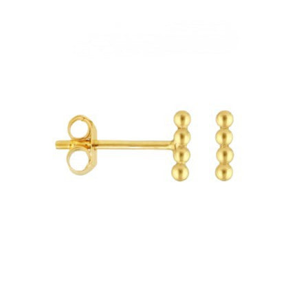 Gold earring with three spherical beads on a white background