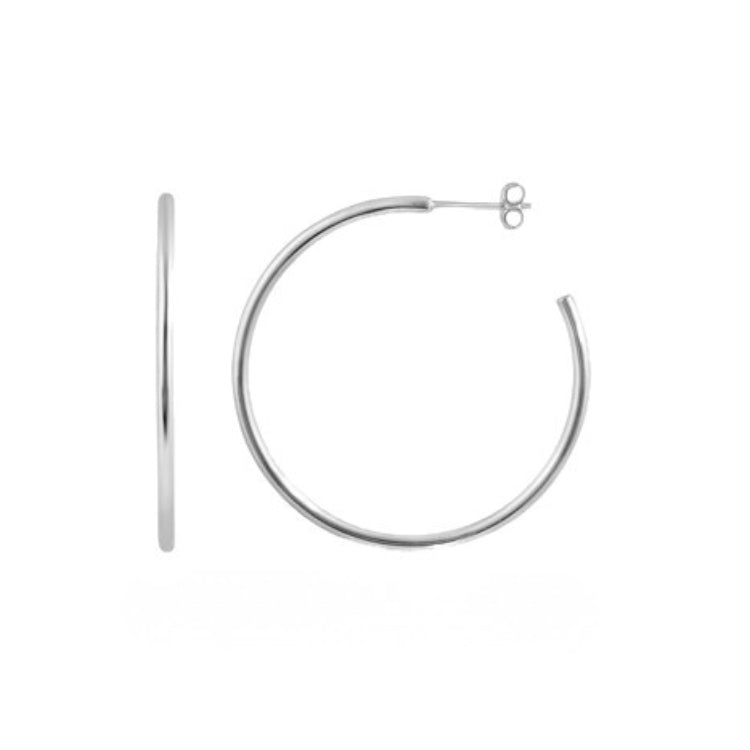 Silver hoop earrings on a white background