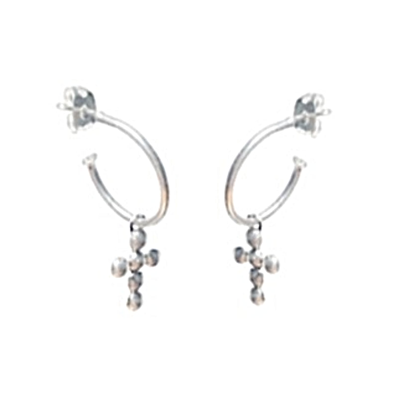 Silver hoop earrings with small dangling beads on a white background