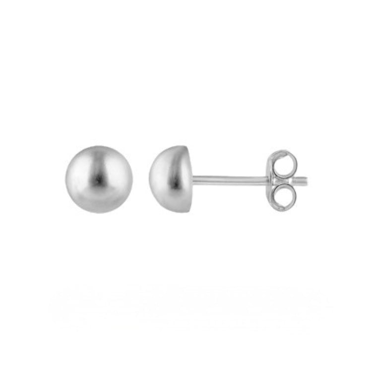 Silver dome earrings on a white background