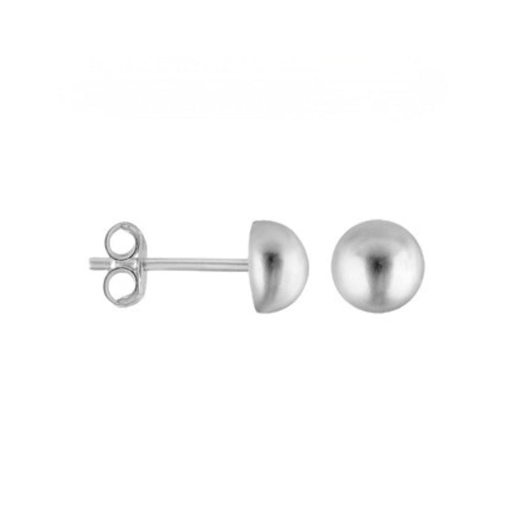Silver dome earrings on a white background