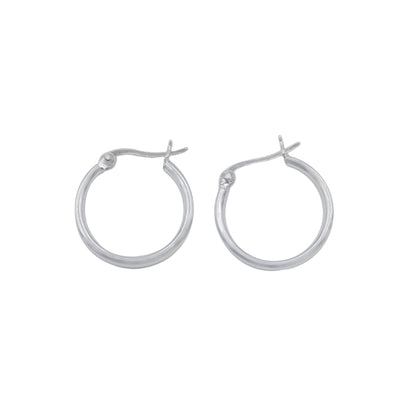 Silver hoop earrings on a white background