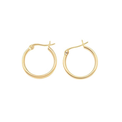 Gold hoop earrings on a white background