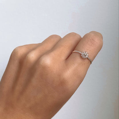 Fine Flower Ring on a finger